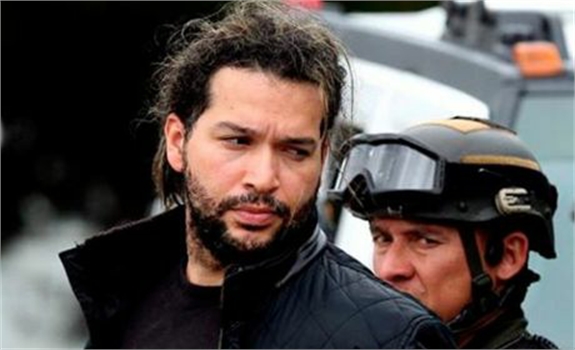Alias 'Sebastian' cuando era trasladado, tras su captura en 2012