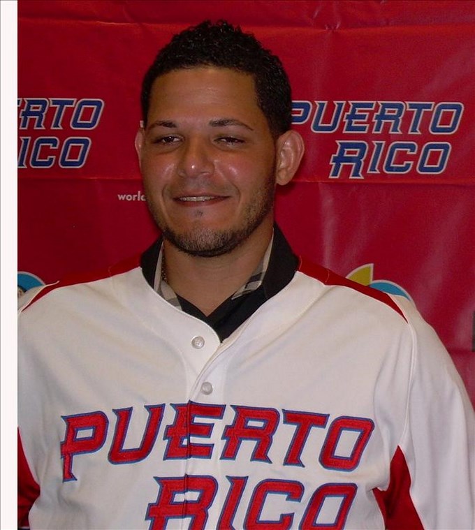 Molina se convirtió en uno de cuatro jugadores de la Serie Mundial en ser protagonistas a la defensiva, esta temporada. EFE.