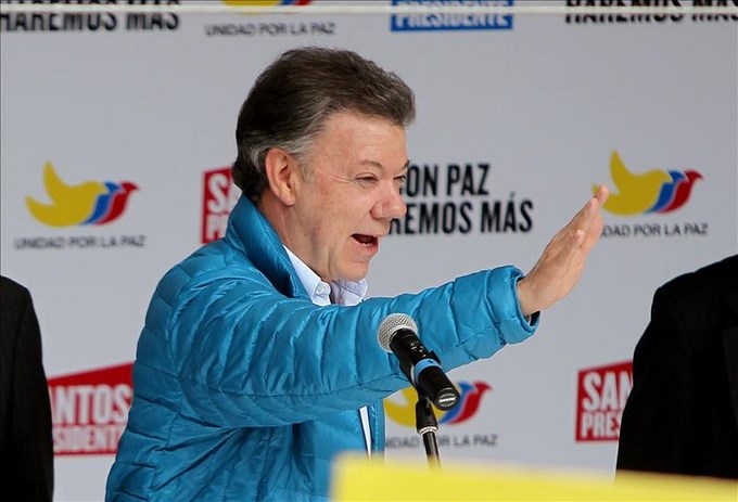 "voy a ganarle a Óscar Iván Zuluaga por lo menos por 8 ó 10 puntos": Santos 4 juan manuel santos