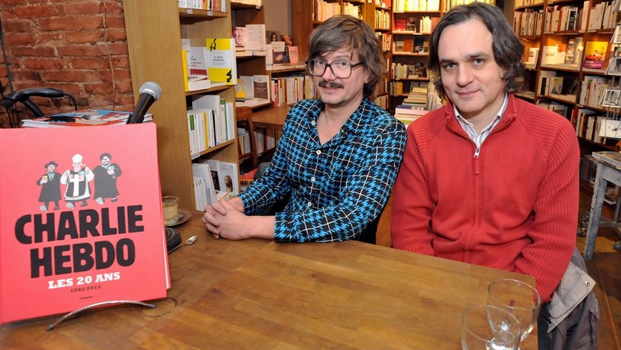 De izquierda a derecha: Renald Luzier, conocido como 'Luz', junto a Laurent Sourisseau o 'Riss'. Foto: Archivo / EFE