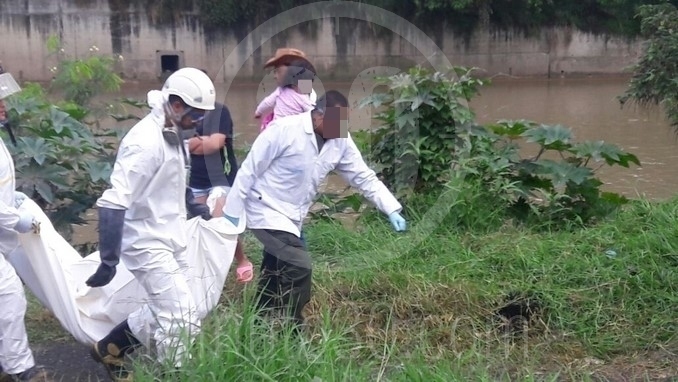 Cadáver de mujer encontrado en el río.