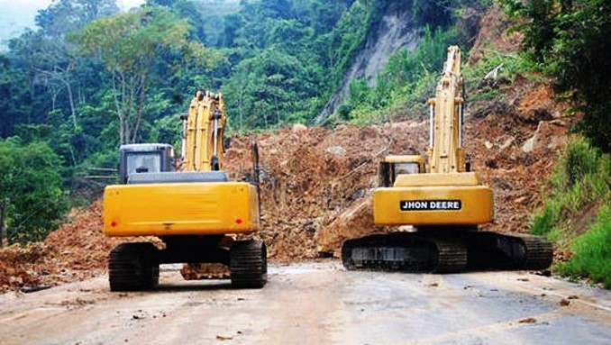 retroexcavadora, maquinaria amarilla, derrumbe