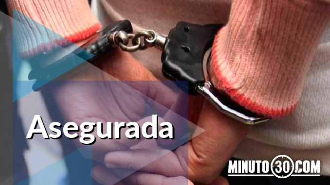 Aseguraron a exempleada bancaria por permitir desfalco cercano a los $3 mil millones 3 mujer asegurada