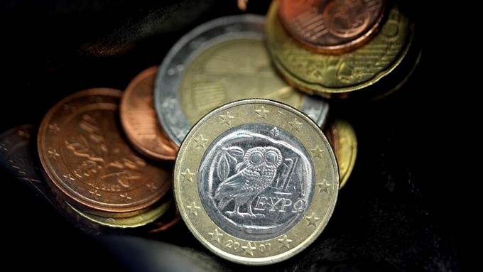 Monedas de euro griegas y alemanas son fotografiadas en un monedero en Düsseldorf en Alemania. EFE/Archivo