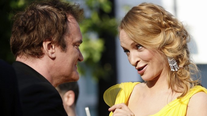 El director estadounidense, Quentin Tarantino y la actriz estadounidense, Uma Thurman en un pase de una película. EFE/Archivo