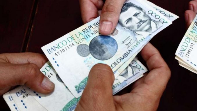 Dinero plata Colombia Predial Bogotá
