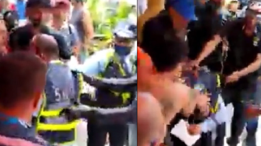 VIDEO: ¡Le dieron puño y pata! Agredieron a agente de tránsito que hacía procedimiento de control en el centro de Medellín