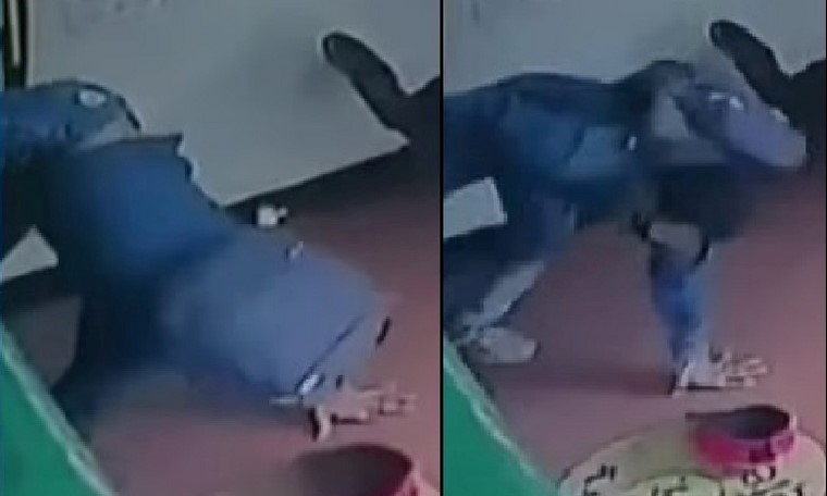 VIDEO: ¡Muy ‘de malas’! Hombre se metió a robar a un local y terminó enredado en la reja