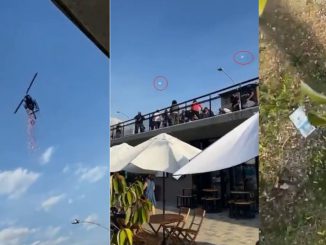 En Guatapé tiraron pétalos de rosa desde un helicóptero y regalaron billetes 1 En Guatapé tiraron pétalos de rosa desde un helicóptero y regalaron billetes