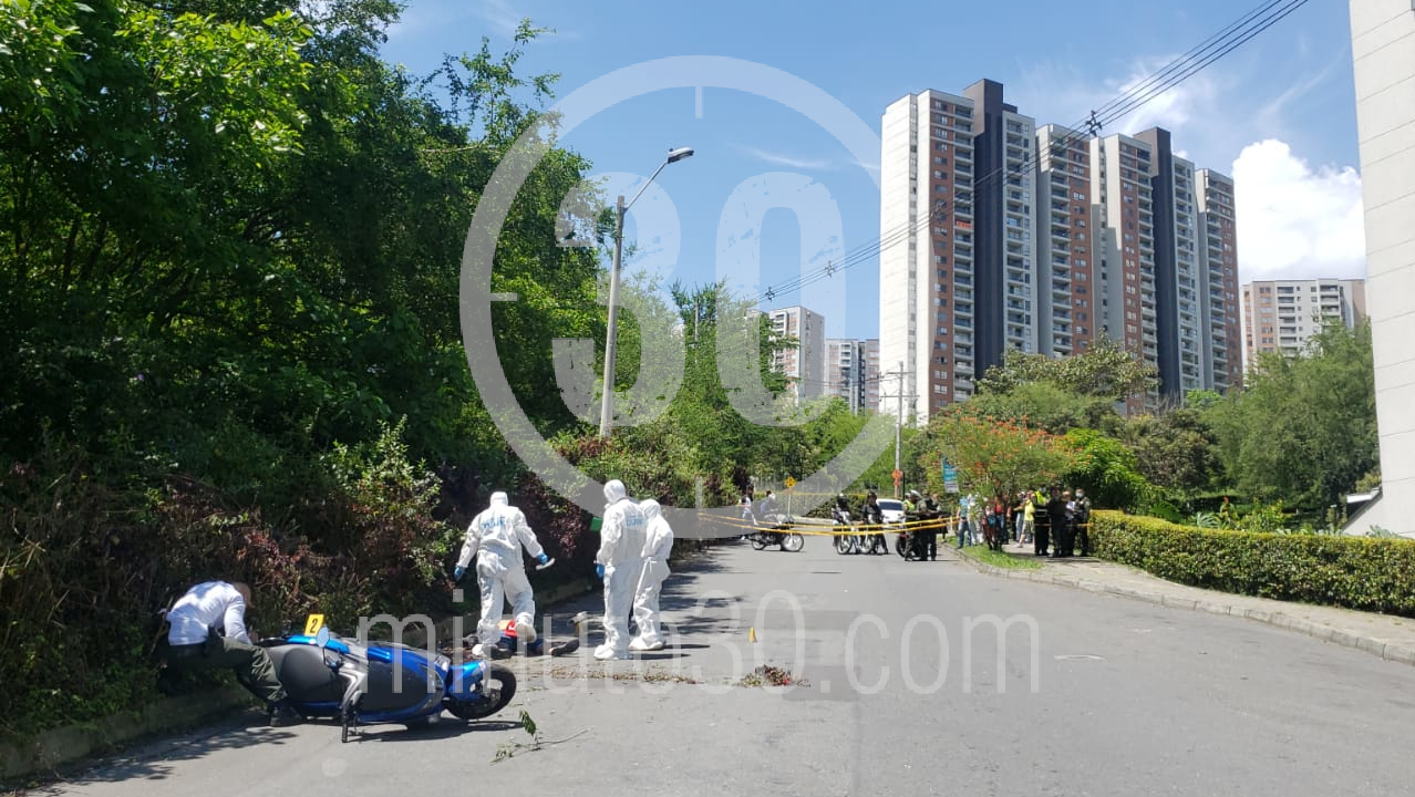 FOTOS Y VIDEO: Sicarios mataron a un hombre que iba en una moto con un niño de parrillero 2 Belén