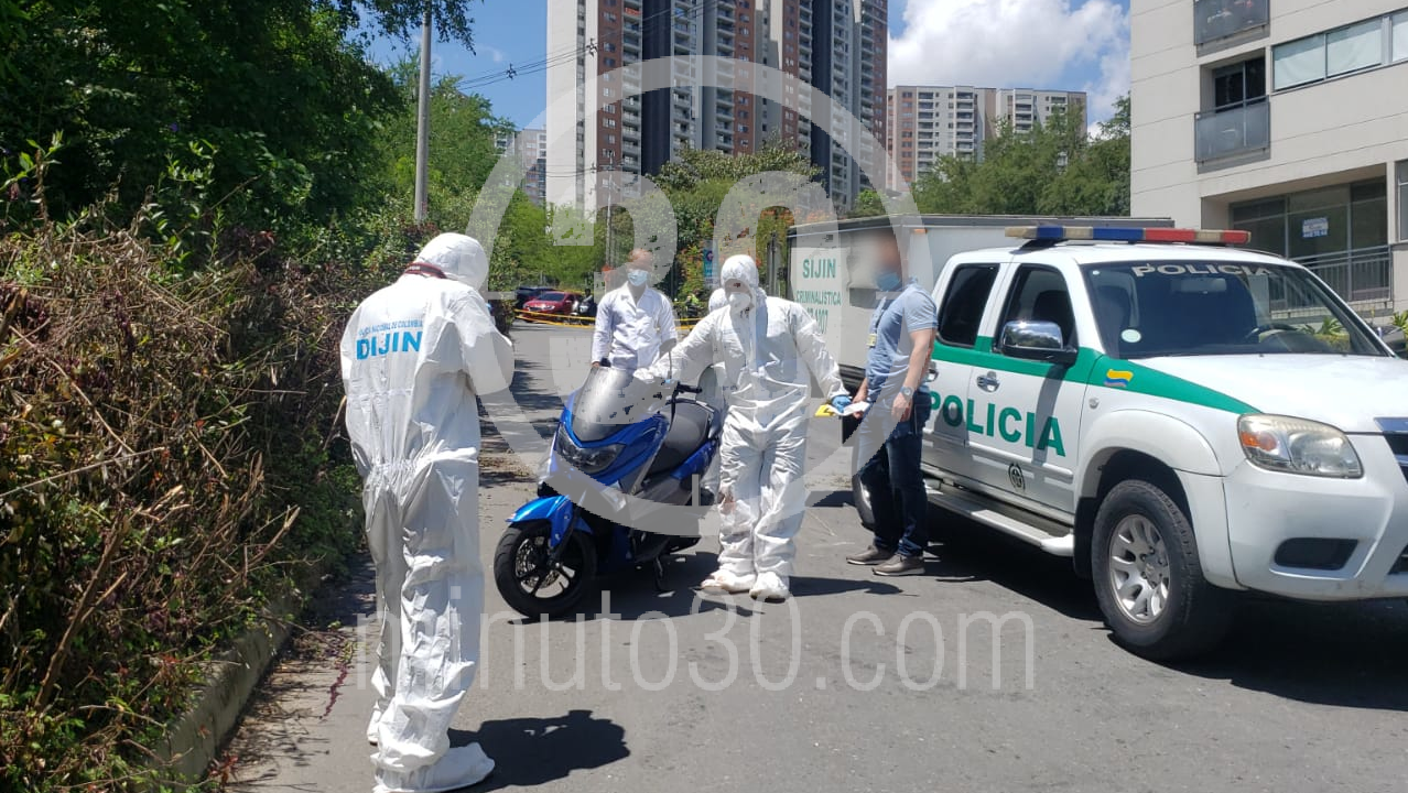 FOTOS Y VIDEO: Sicarios mataron a un hombre que iba en una moto con un niño de parrillero 3 Belén