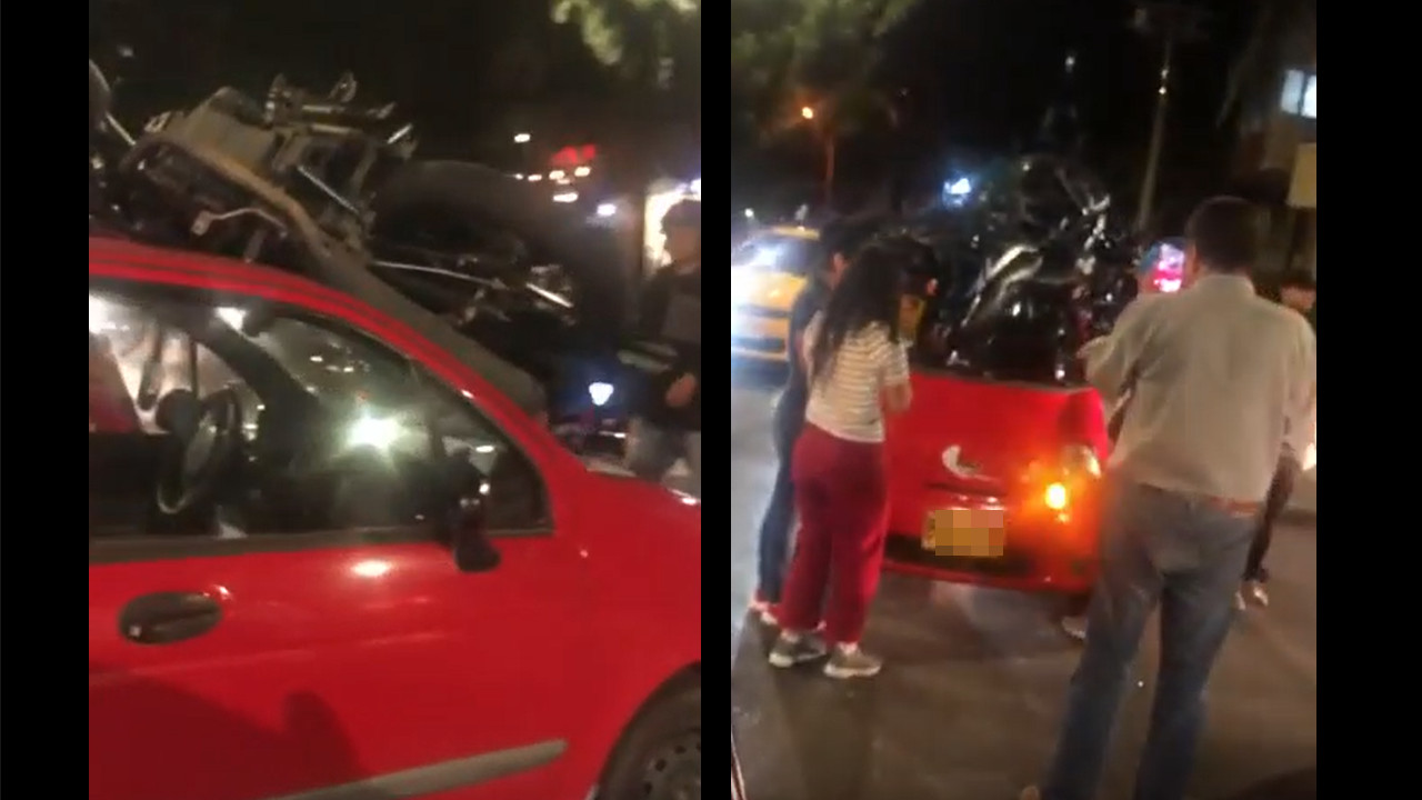 Una moto quedó encima de un carro tras un accidente en Laureles