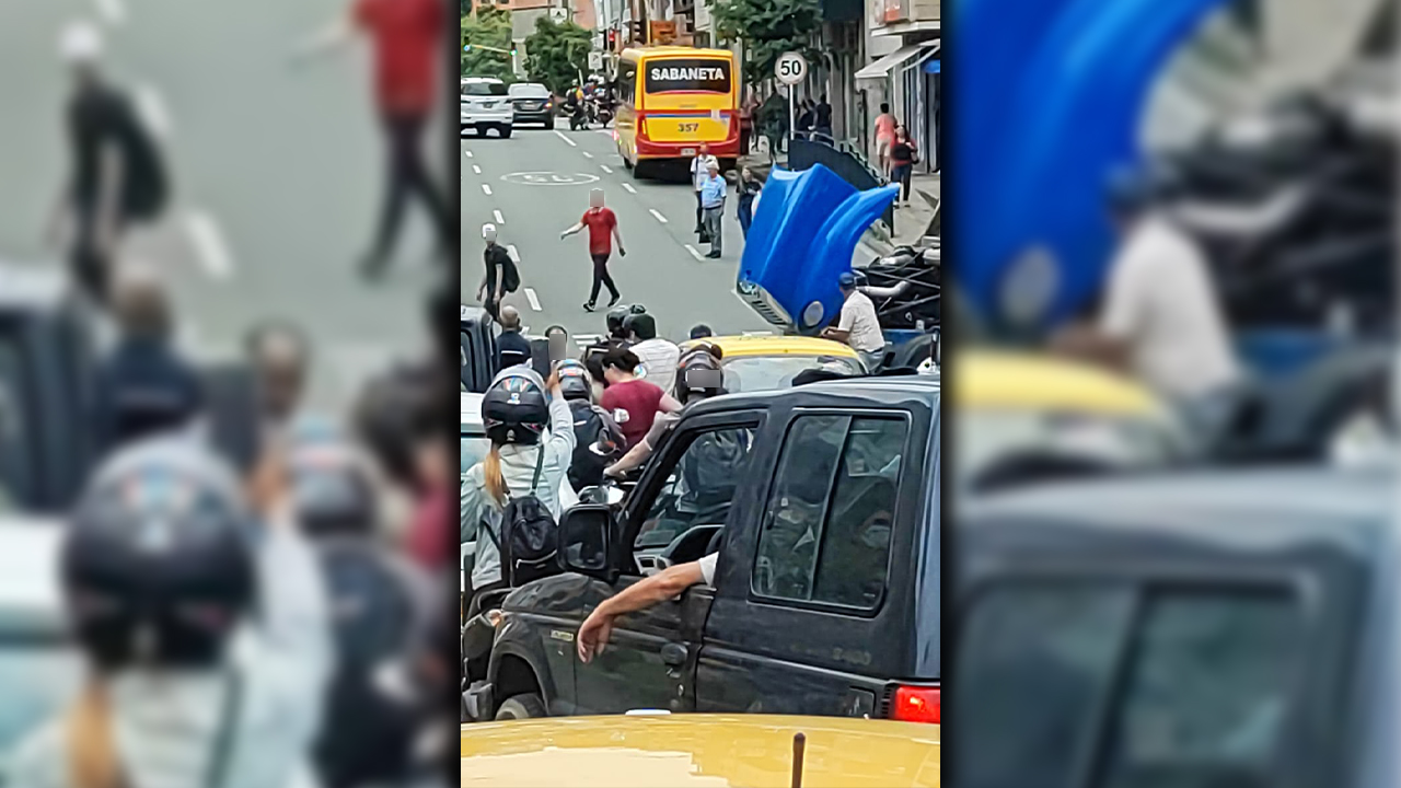 [FOTOS] Taco en Envigado por un camión varado, para acabar de ajustar se agarraron a pelear en la calle