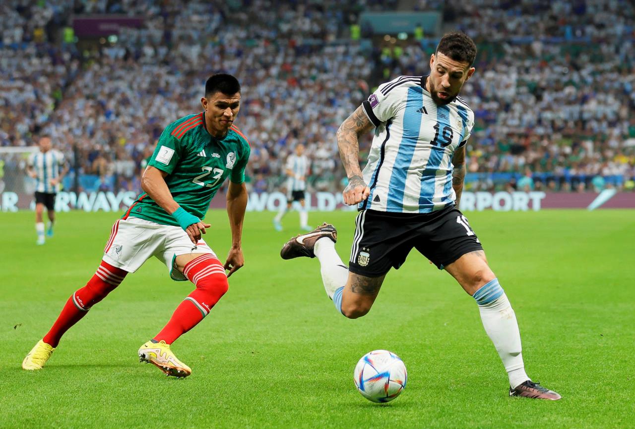 FOTOS: Decisivo Messi, notable Otamendi 2 messi y otamendi2