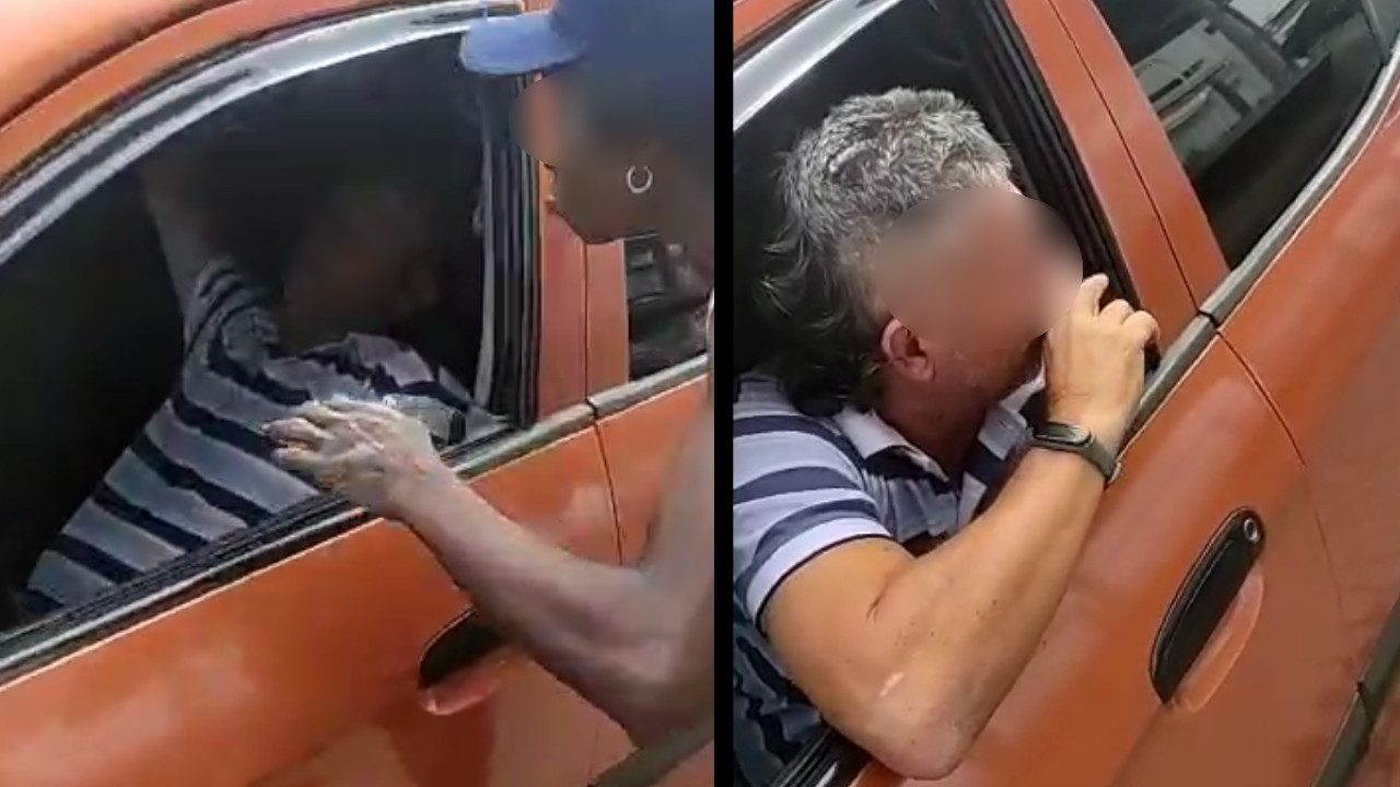 [VIDEO] ¡Dio papaya! En Medellín un hombre se quedó dormido y habitante de calle le dio un 'piquito'