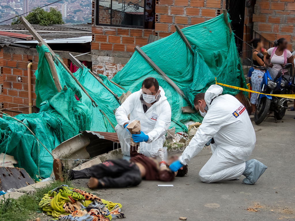 VIDEO Y FOTOS. ¿Lo tiraron de un carro? Mataron a un hombre en el Popular 8 DSCN3100