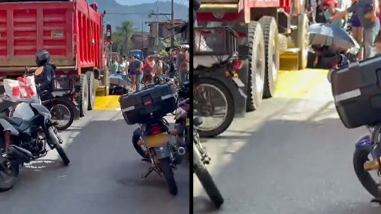 ¡Qué imprudencia! Motociclista queda debajo de una volqueta en la Av. Paralela
