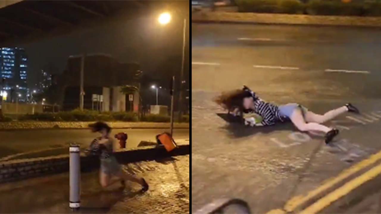 Mujer es arrastrada varios metros por los fuertes vientos del tifón Saola