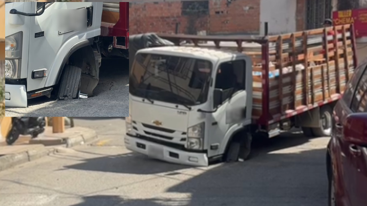 Camión quedó atrapado tras un hundimiento del pavimiento en Bello