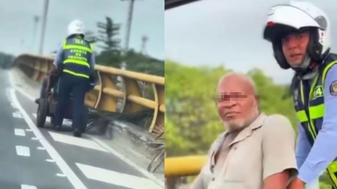 Agente de tránsito en Cali se roba aplausos: ayudó a un hombre en silla de ruedas
