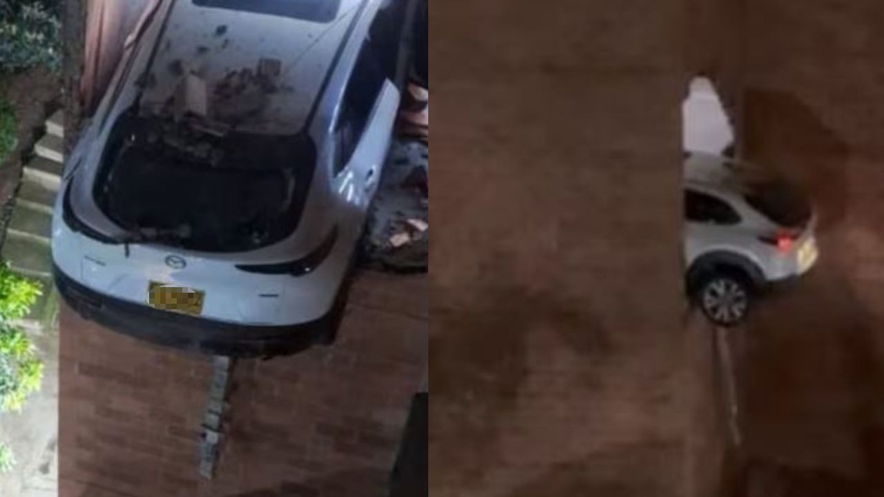  carro atravesó la pared del parqueadero y quedó colgando en Medellín